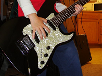 Custom Strat (with my number 1 son well-attached)